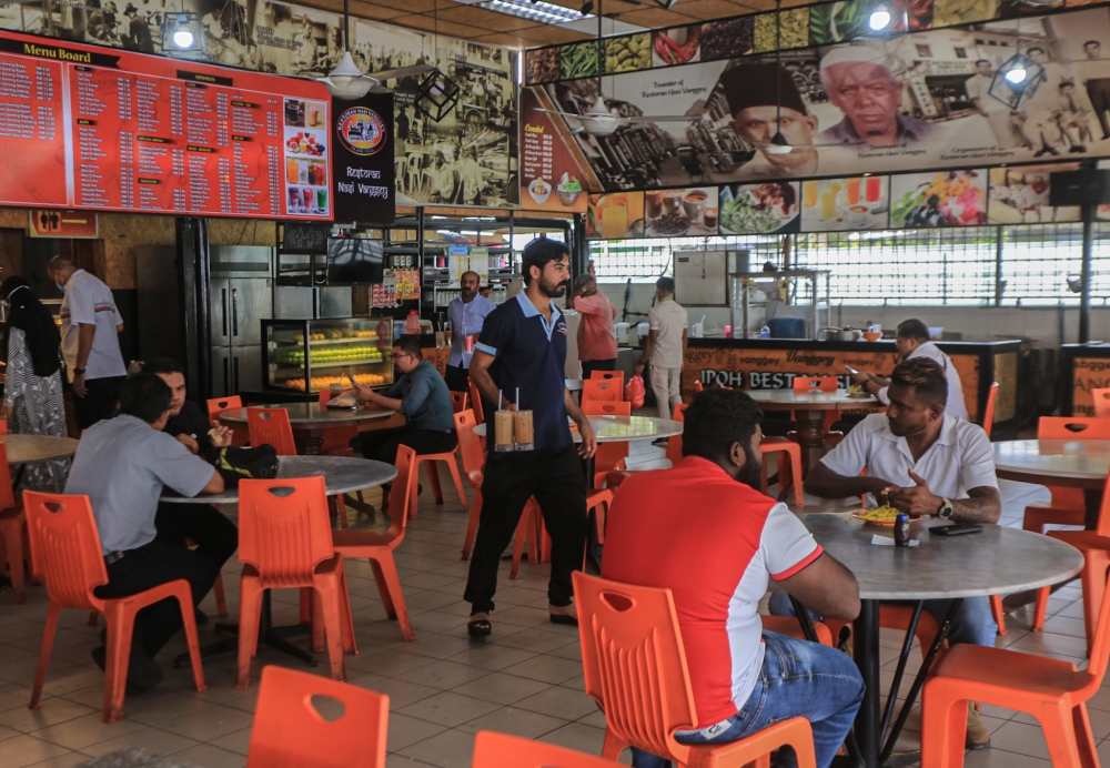There are many kopitiams, mamak and hawker stalls, and neon-lit night markets to sample our world-famous street fare, like laksa, roti canai, and nasi lemak. — File picture by Farhan Najib