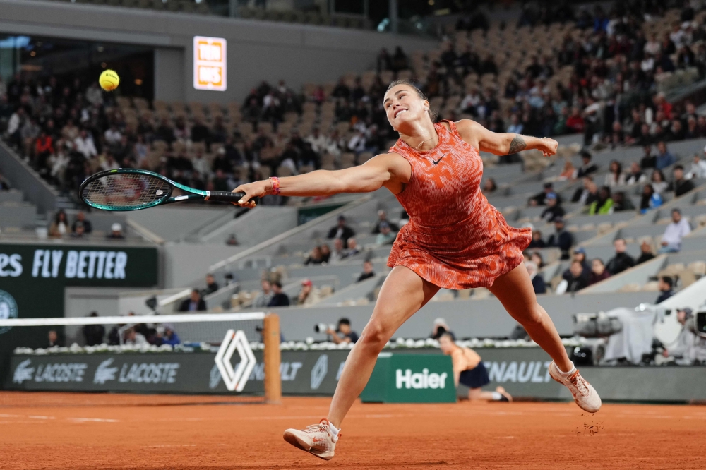 Belarus’ Aryna Sabalenka plays a backhand return to Japan’s Moyuka Uchijima during their women’s singles match on Court Philippe-Chatrier on day five of the French Open tennis tournament at the Roland Garros Complex in Paris on May 30, 2024. — AFP pic 