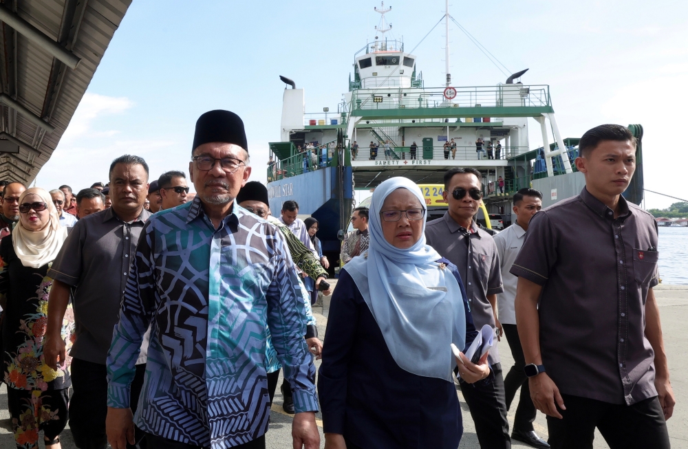 Prime Minister Datuk Seri Anwar Ibrahim makes a visit to the Labuan Roll-on Roll-off (RORO) Ferry Terminal in Labuan, May 31, 2024. Also present is Minister in the Prime Minister’s Department (Federal Territories) Dr Zaliha Mustafa. — Bernama pic 