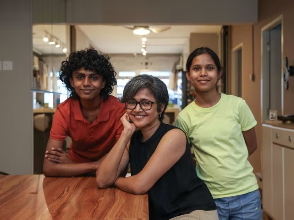 Anju Tupili with her son Yohan Ayush, 17, and daughter Hossana Yakubi, 12, both of whom she has home-schooled. — TODAY pic