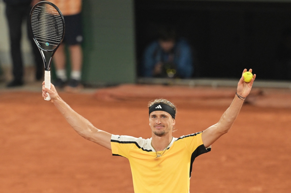 Germany's Alexander Zverev celebrates after winning against Netherlands' Tallon Griekspoor at the end of their men's singles match on Court Philippe-Chatrier on day seven of the French Open tennis tournament at the Roland Garros Complex in Paris on June 1, 2024. — AFP pic