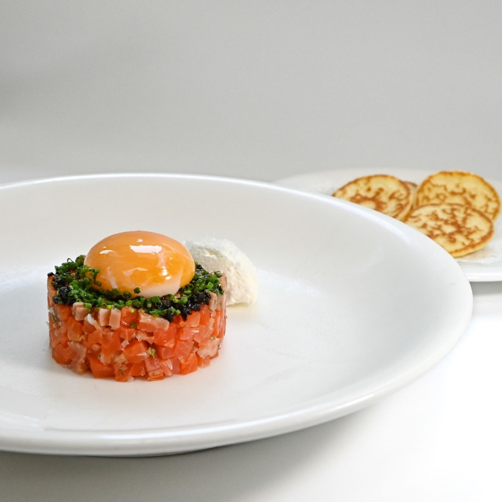 Smoked ocean trout with blinis, the first course in Cilantro Restaurant and Wine Bar’s curated 3-course lunch tasting menu at RM128. — Picture courtesy of FunNow Malaysia