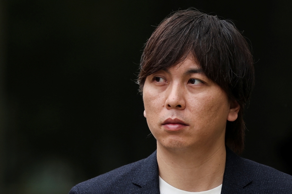 Ippei Mizuhara, the former interpreter for Japanese baseball star Shohei Ohtani, walks outside the federal court in Santa Ana, California June 4, 2024. — Reuters pic