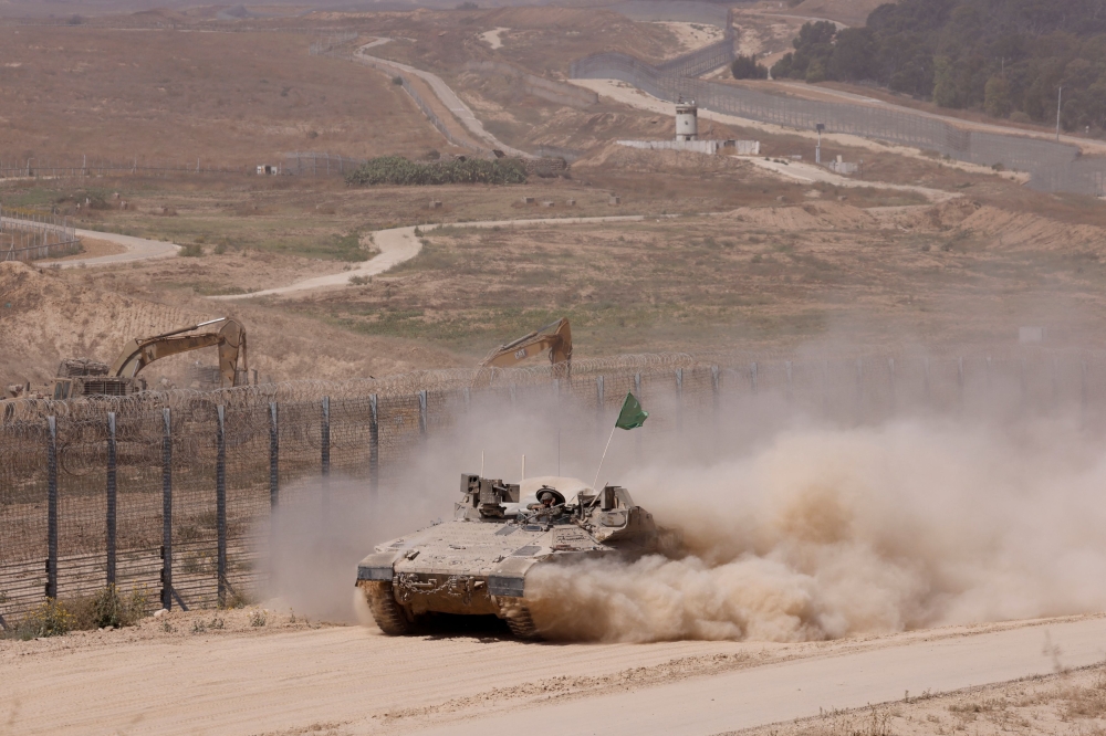 Israeli tank manoeuvres near the Israel-Gaza border, amid the ongoing conflict between Israel and Hamas, in Israel, June 8, 2024. ― Reuters pic