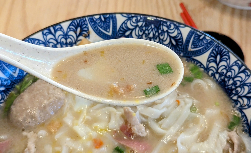 The soup here isn’t just cloudy; it’s almost completely opaque.