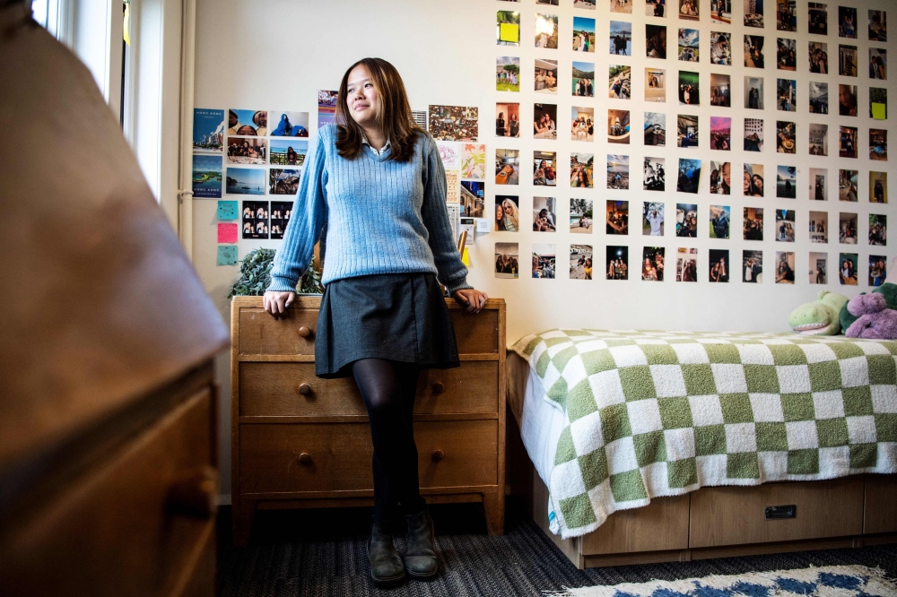 Amelia Lee poses in her bedroom, the same one where Britain's King Charles III used to live when he was pupil at the Gordonstoun School, in Elgin, in the Scottish Highlands, on May 22, 2024. — AFP pic