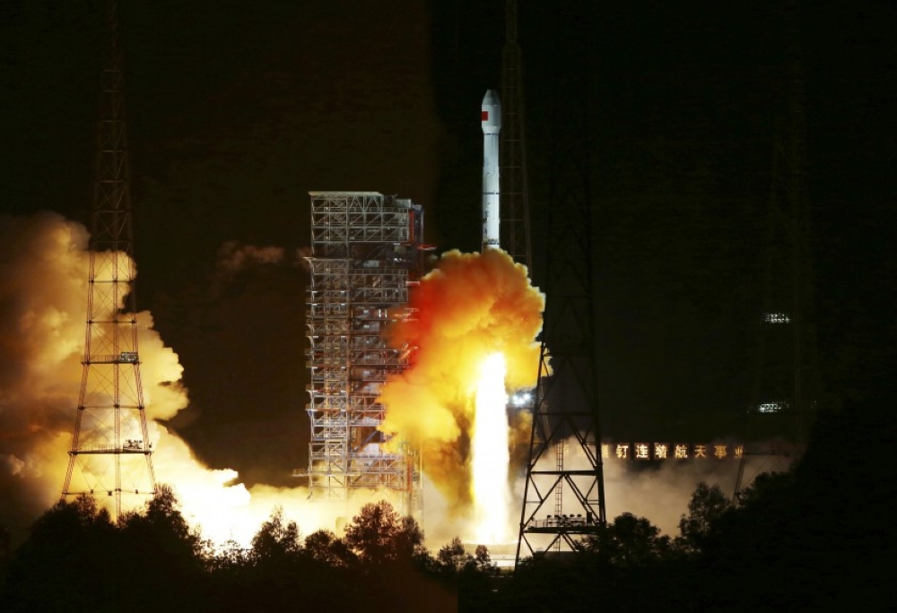 File photo of a spacecraft, lifting off from the launch pad at the Xichang Satellite Launch Center, Sichuan province, China October 24, 2014. - Reuters pic