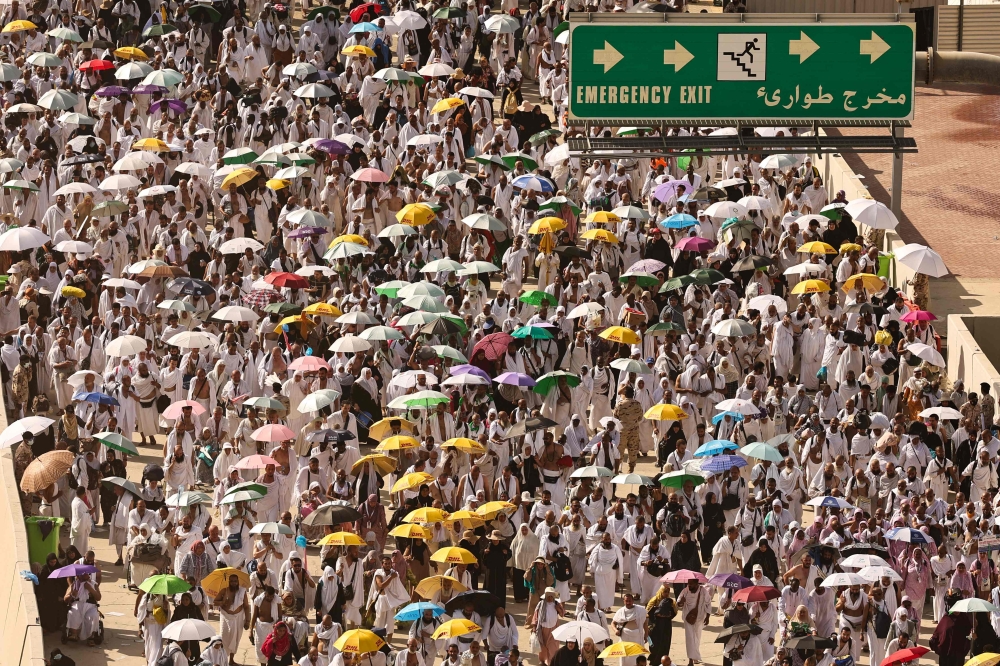 File photo of Muslim pilgrim arriving to perform the symbolic ‘stoning of the devil’ ritual during the annual hajj pilgrimage in Mina on June 16, 2024. — AFP pic