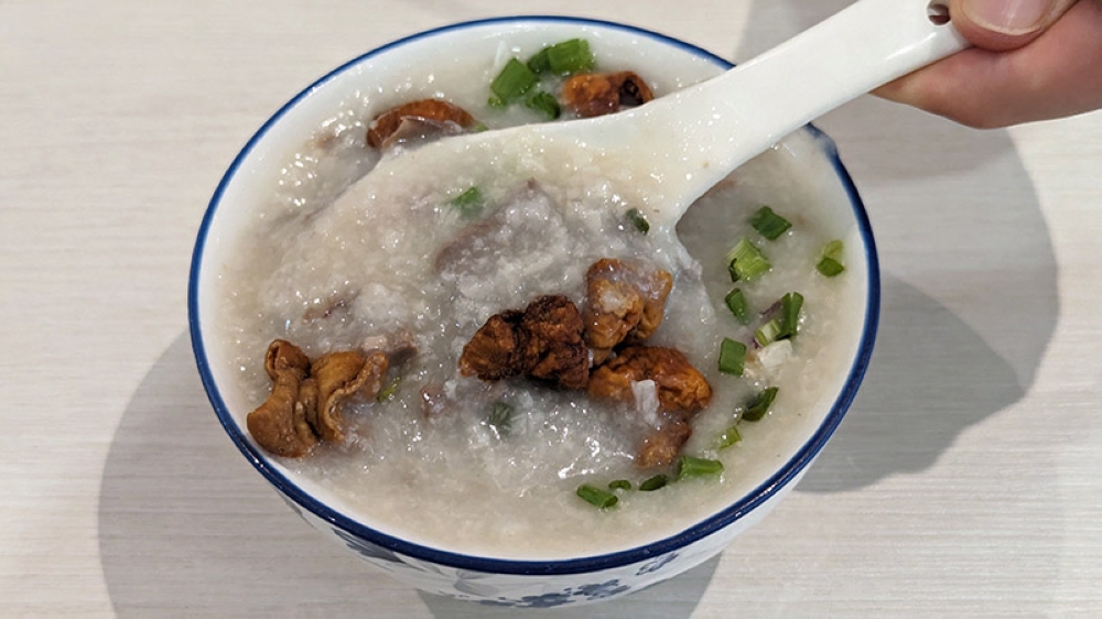 Pork intestine porridge with slices of pork heart and tongue thrown in too.