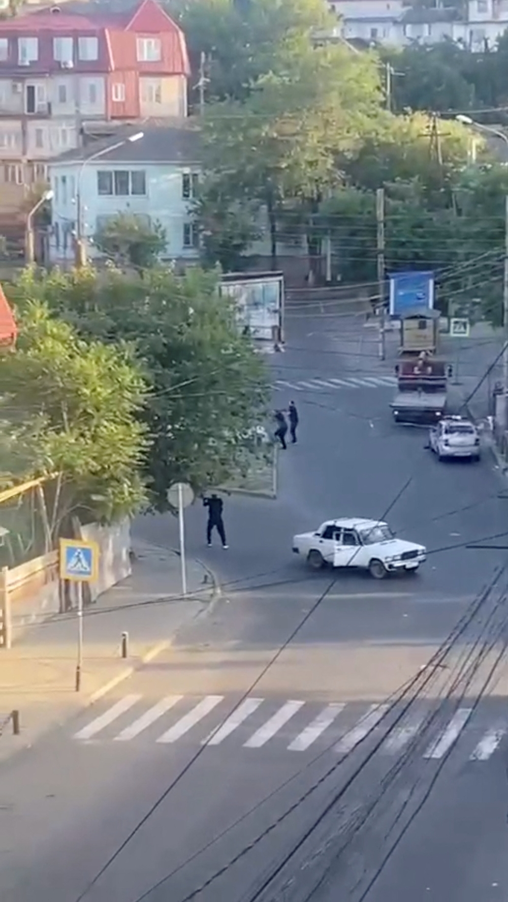 This still image obtained from a video shows shooting on the streets of Makhachkala in southern Russia, June 23, 2024. — Reuters pic