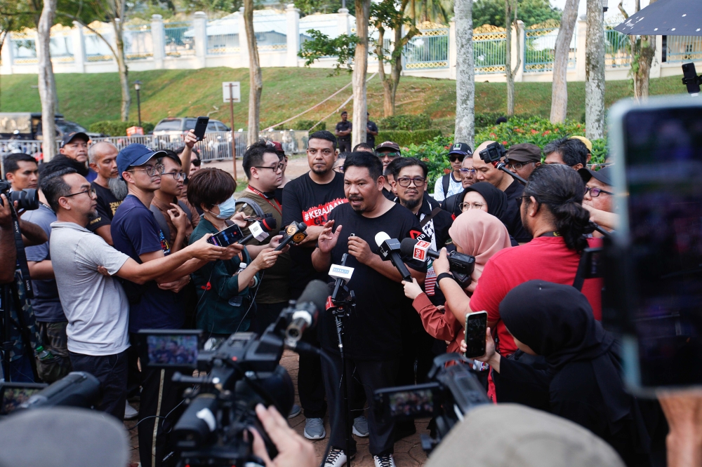 Organiser Aidil Yunus speaks to the press after the 'Rakyat Tolak Anwar' demonstration at the Seri Perdana Complex in Putrajaya June 29, 2024. — Picture by Sayuti Zainudin 