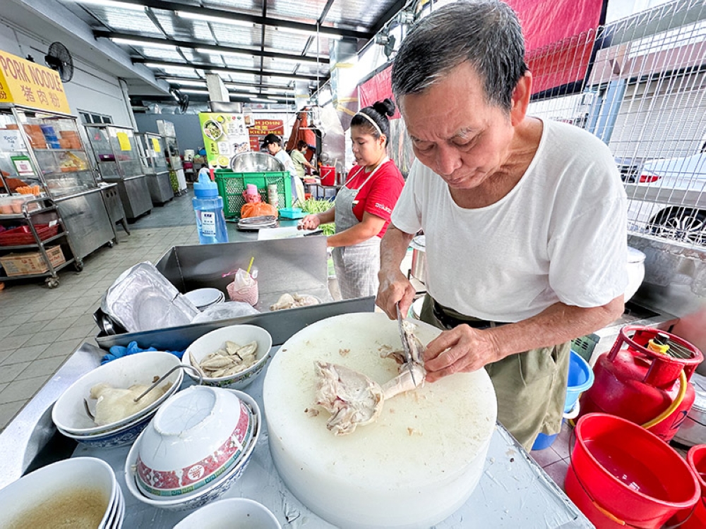 Penang native Gooi Sia Kim started selling 'kuey teow thng' in PJ Old Town back in 1972.