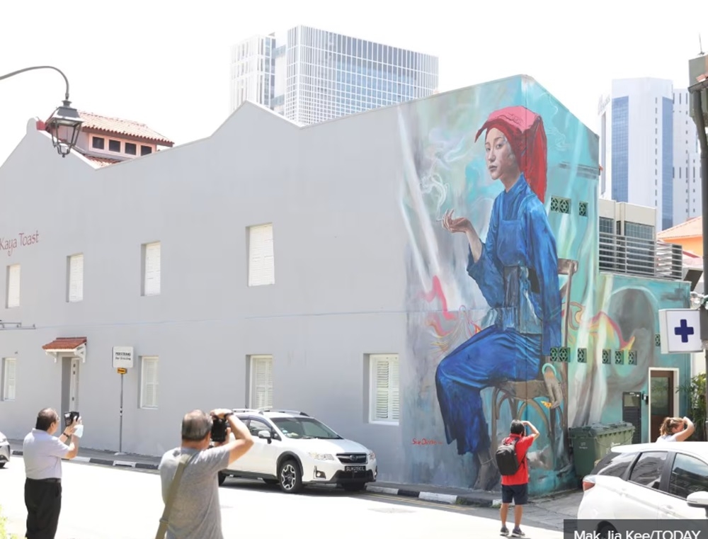 Artist Sean Dunston’s mural of a samsui woman with a cigarette in her hand that has been in the spotlight recently. — TODAY pic