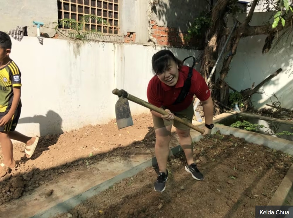 Kelda Chua photographed in 2017 on a mission trip to Cambodia to help with house building. — Picture courtesy of Kelda Chua