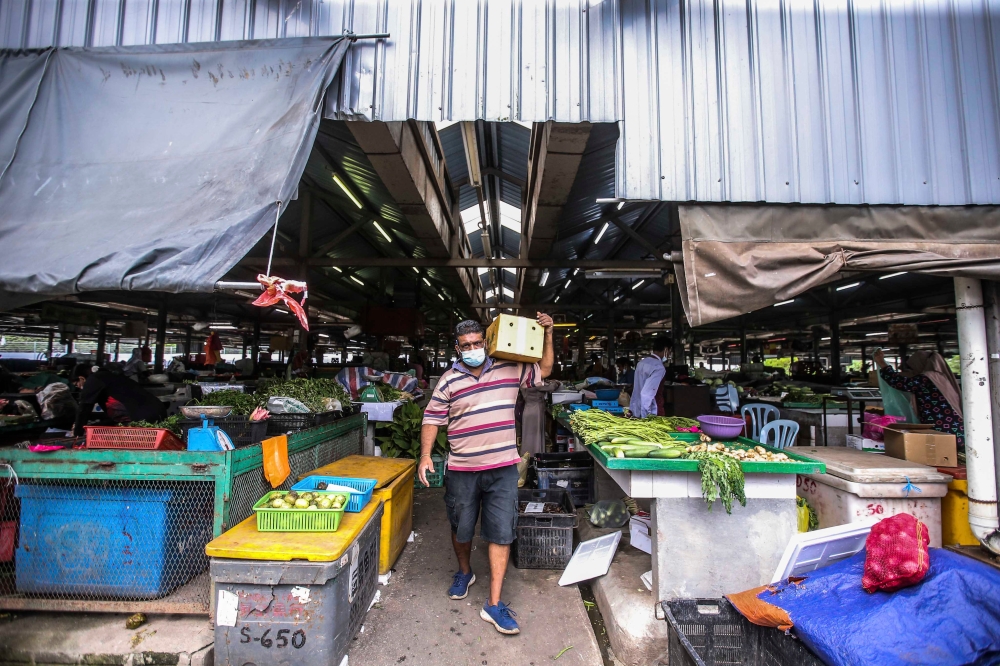 The Selayang wholesaler's market is a popular place to buy fresh ingredients at a cheaper price. — File picture by Hari Anggara