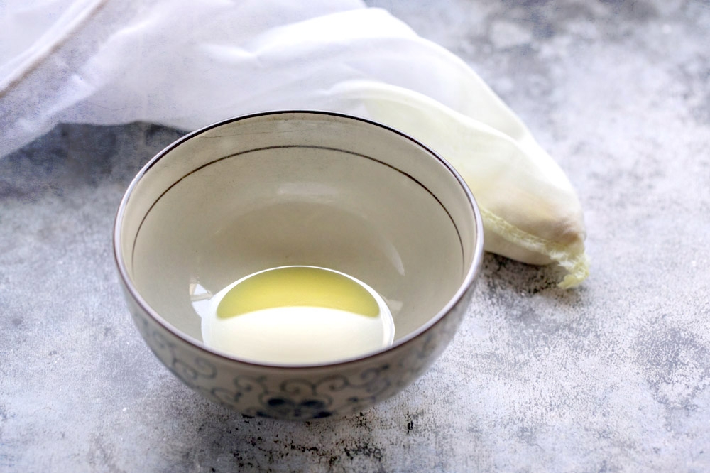 A bowl of freshly squeezed ginger juice.