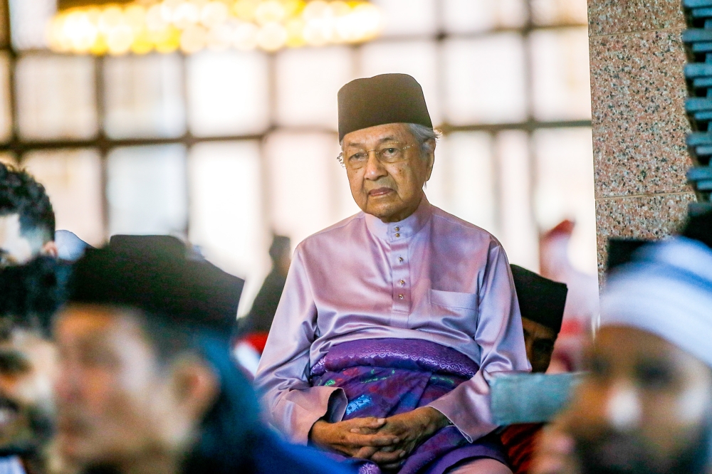 Former prime minister Tun Dr Mahathir Mohamad (centre) perform the Aidiladha prayer at Putra Mosque in Putrajaya June 29, 2023. — Picture by Hari Anggara