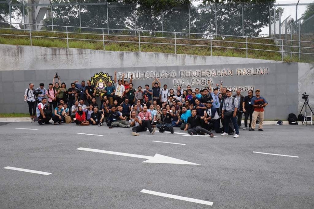 Media personnel at the Malaysian Anti-Corruption Commission headquarters a day before Najib was brought to court to face criminal charges in 2018.