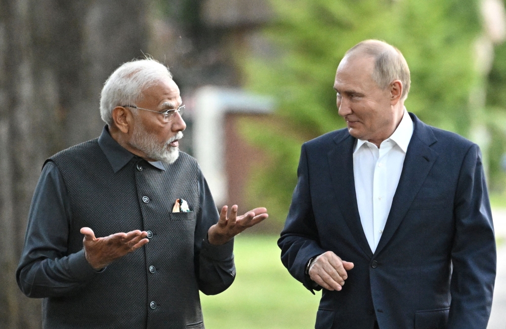 Russia’s President Vladimir Putin and India’s Prime Minister Narendra Modi walk during their meeting at the Novo-Ogaryovo state residence near Moscow, Russia July 8, 2024. — Sputnik/Sergei Bobylyov handout pic via Reuters 