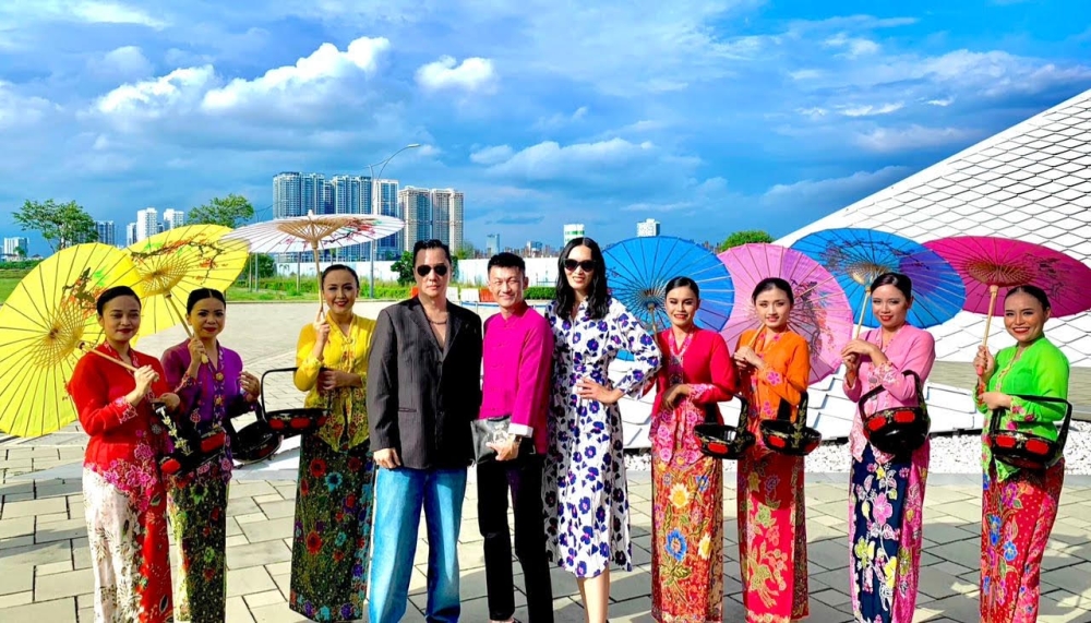 Guests at the relaunch included Nico, Liew and Tan, flanked here by dancers in Nyonya kebaya. — Picture courtesy of Encore Melaka