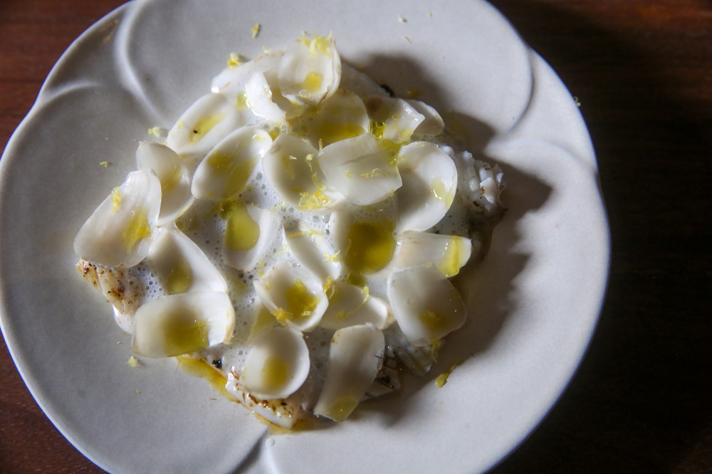 The cuttlefish looks like an unassuming dish but tells a tale of the many influences in Lau’s cooking.