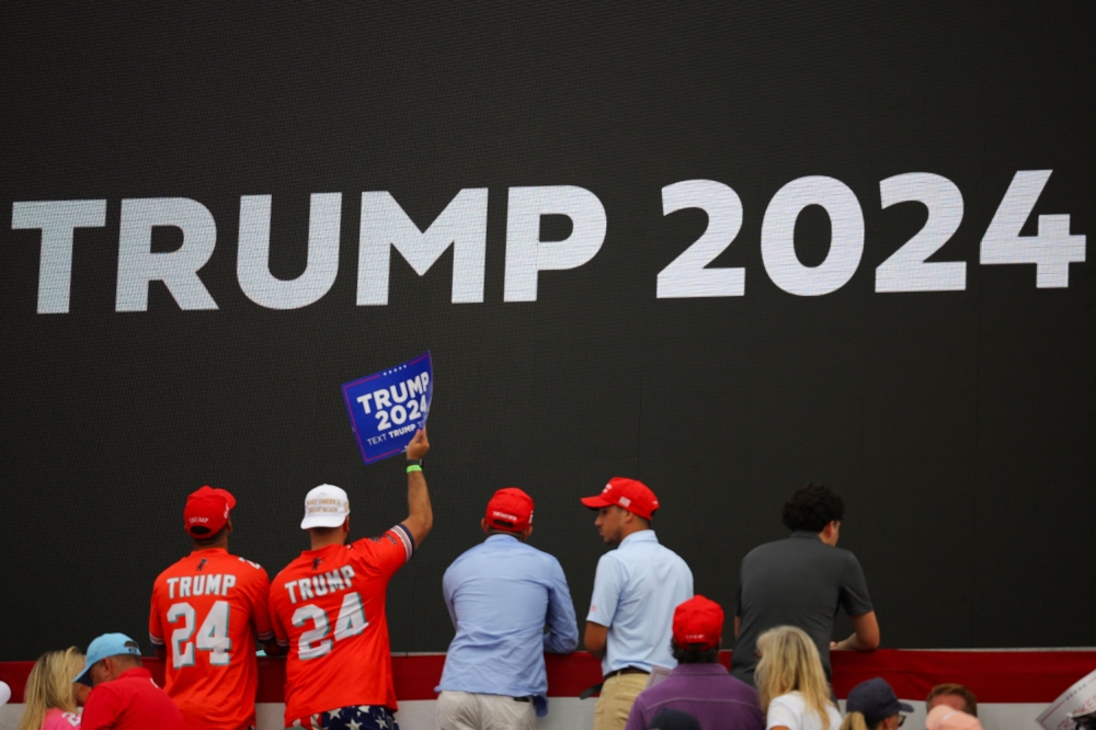 Supporters of Republican presidential candidate and former US President Donald Trump attend a campaign rally at Trump's golf resort in Doral, Florida July 9, 2024. — Reuters pic  