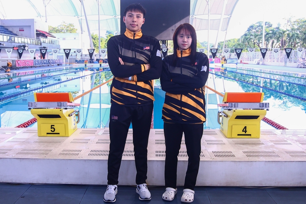 Malaysian national swimmers Khiew Hoe Yean (left) and Tan Rouxin will be debuting in the Paris Olympics 2024. — Picture from Facebook/Olympic Council of Malaysia