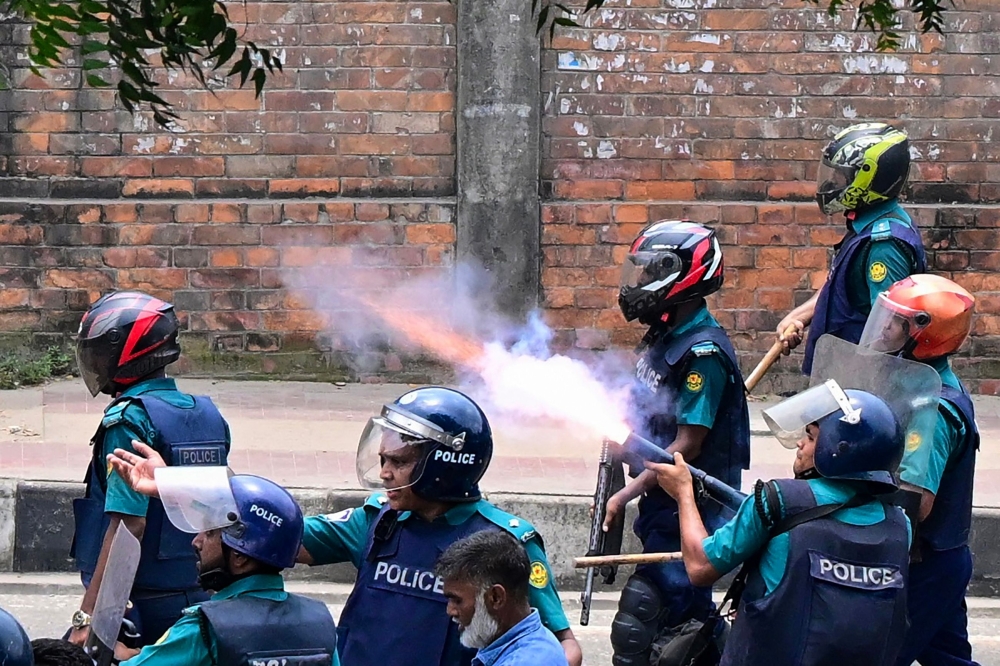 Bangladesh police fire tear shells to disperse protesters. — AFP pic