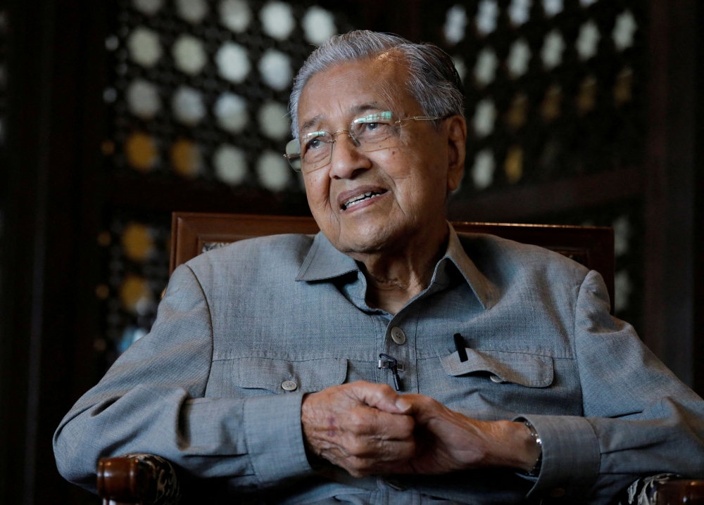 File picture of Tun Dr Mahathir Mohamad speaking during an interview in Putrajaya, November 8, 2022. Judicial Commissioner Gan Techiong has advised the former prime minister to refrain from travelling abroad to ensure his civil suit against Deputy Prime Minister Datuk Seri Ahmad Zahid Hamidi proceeds without further delay. — Reuters pic 