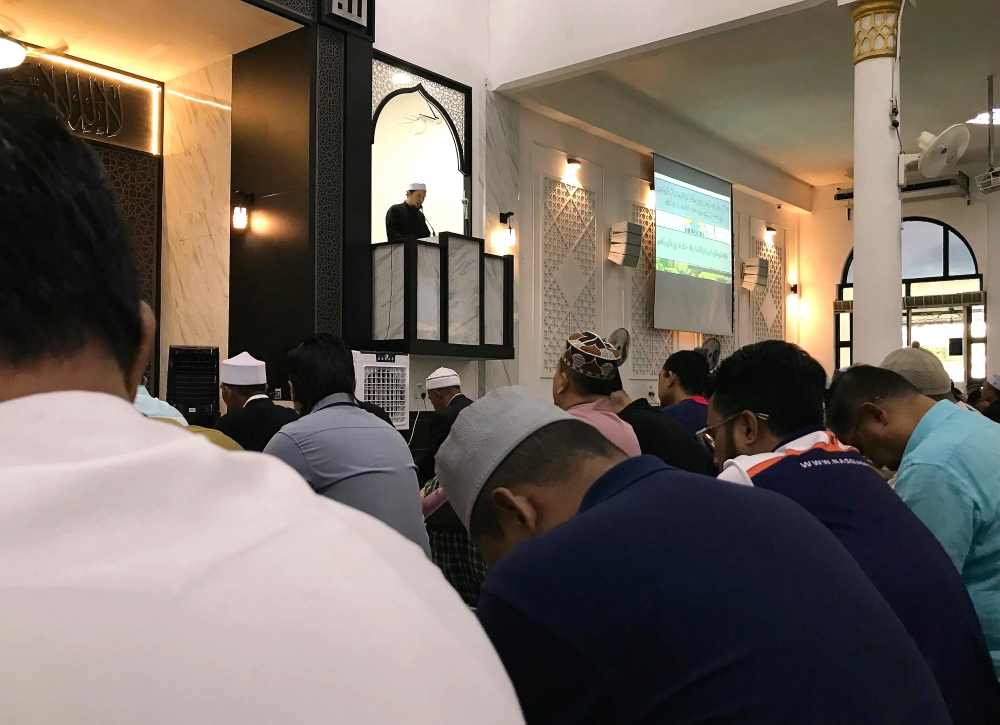 Congregants listen to a special sermon and Friday prayers at the National Mosque, July 19, 2024. — Bernama pic  