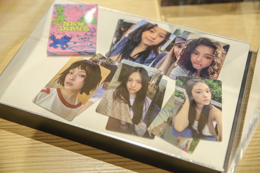 Photocards which are printed selfies of K-pop idols are collectible items and can fetch a hefty price tag.