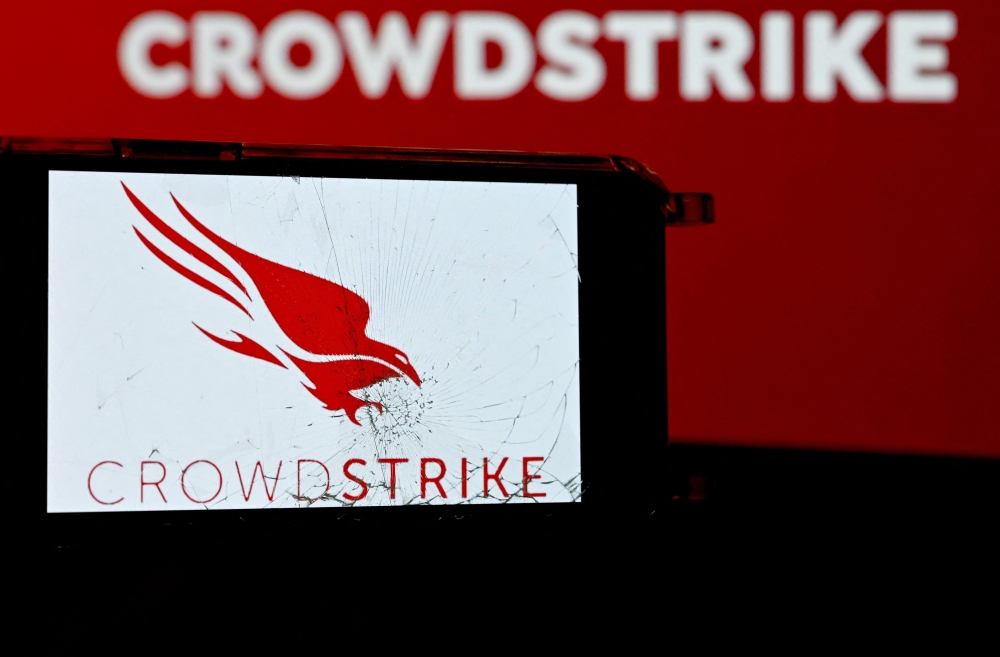 The logo of CrowdStrike cybersecurity technology company in Paris. — AFP pic