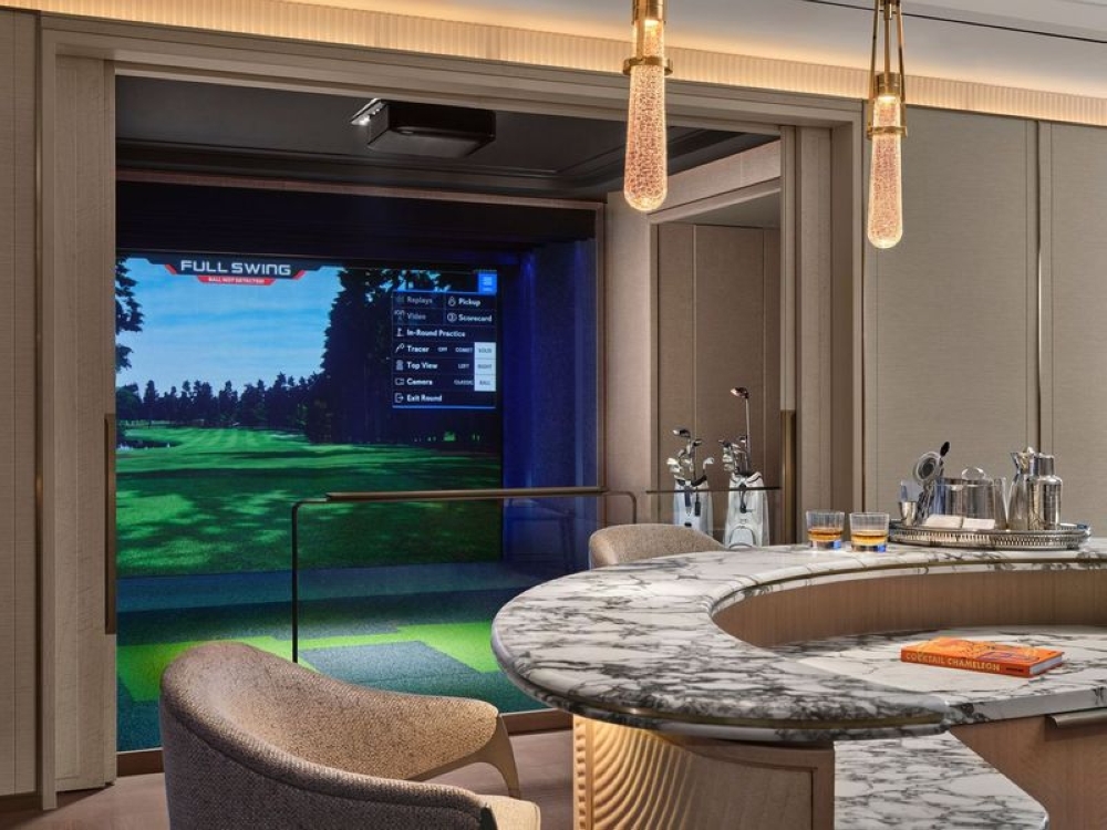 Sports takes the spotlight, particularly in the Presidential Suite with a golf simulator.