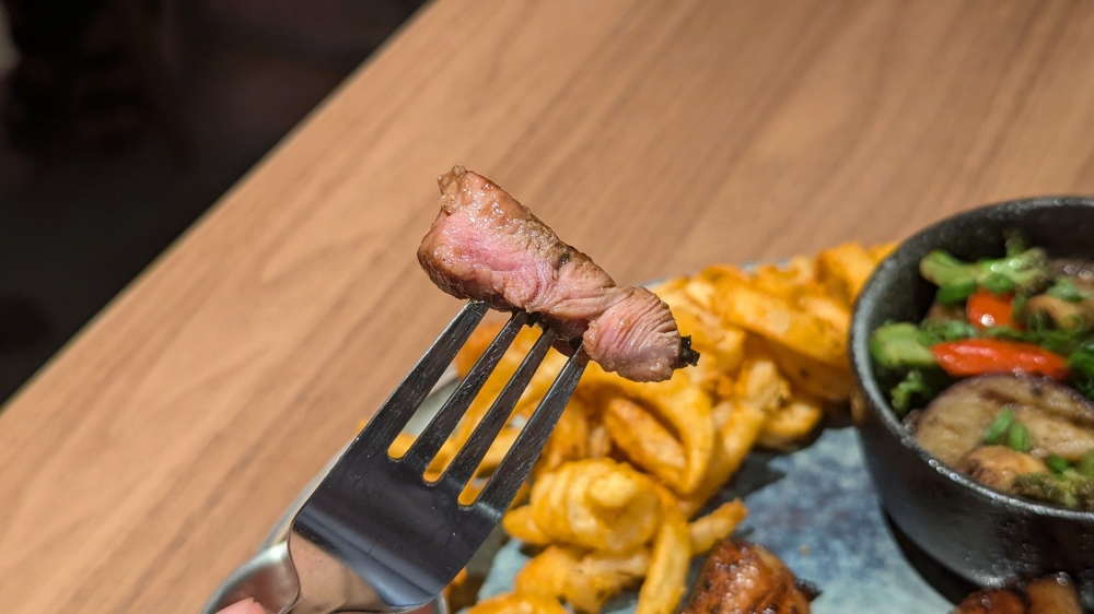 Perfectly pink! The pork chops are grilled till adequately smoky while retaining the perfect doneness.