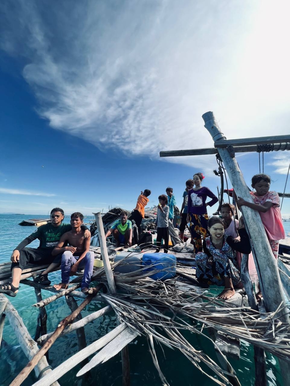 A displaced Bajau Laut family taking a break from looking through the remains of their demolished home at Pulau Tatangan, Sabah on June 5, 2024 — Picture courtesy of Borneo Komrad