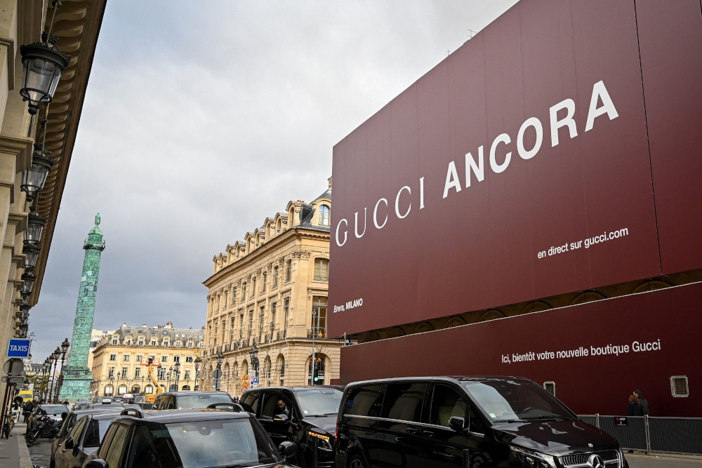 A host of city landmarks in Paris — from the Opera Garnier to the Obelisk of Luxor on the Place de la Concorde and part of the Louvre Museum — have been covered by giant billboards in recent years. — AFP pic 