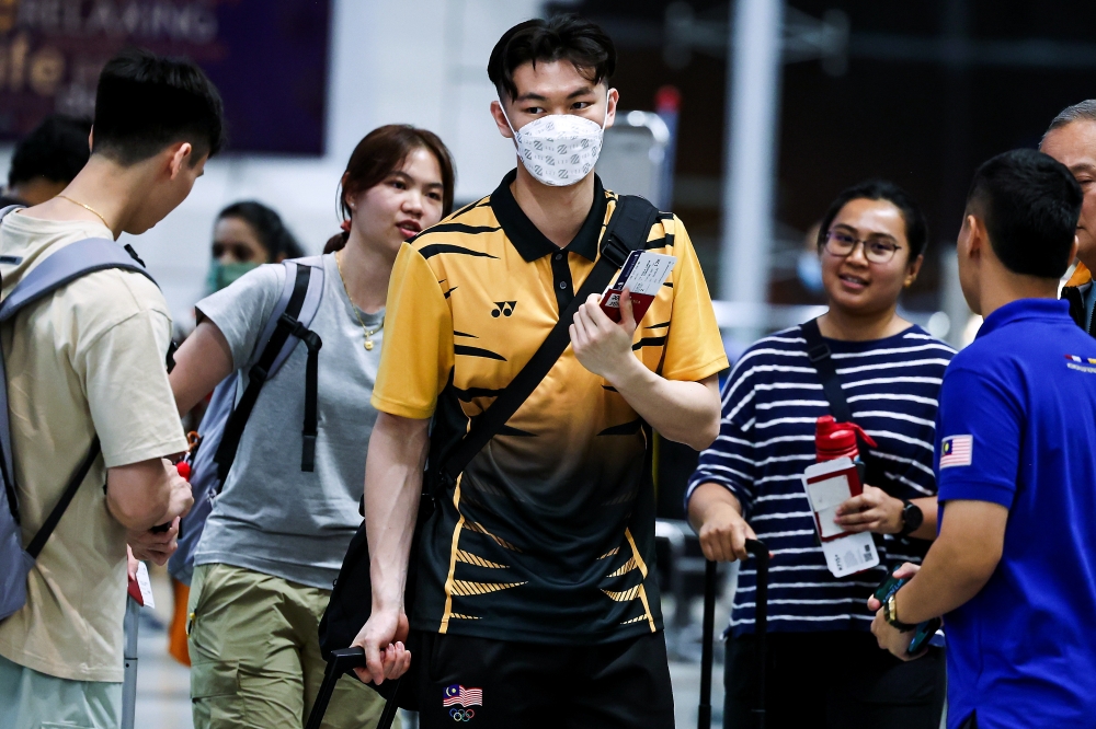 National men’s singles badminton champion Lee Zii Jia is seen leaving for the Paris 2024 Olympic Games at KLIA July 23, 2024. — Bernama pic