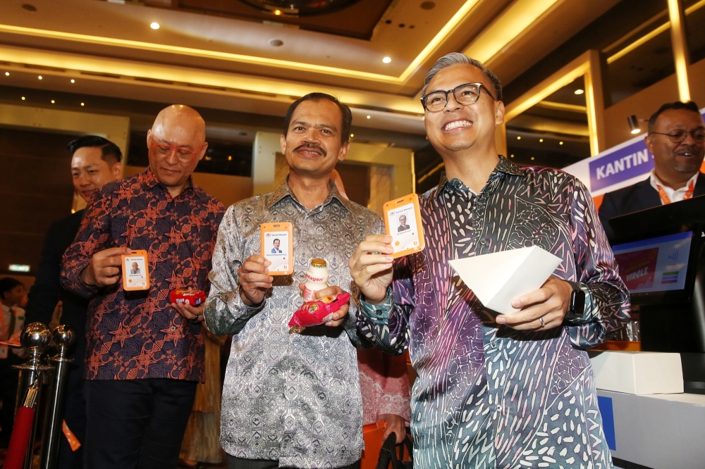 Communications Minister Fahmi Fadzil with Wong Heang Tuck, CEO of U Mobile launching the U Mobile Digital School Pillar at Nexus Bangsar South. July 23, 2024. — Picture by Choo Choy May.