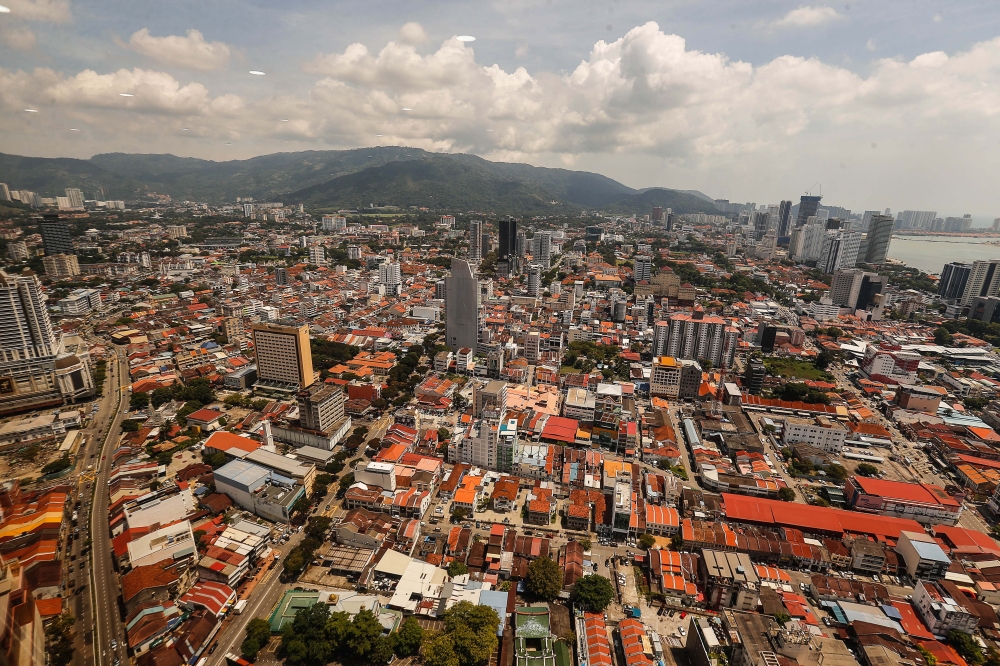 An aerial view of Penang, including the Unesco Heritage Site, is seen from Level 52 of Komtar in George Town July 19, 2022. — Picture by Sayuti Zainudin