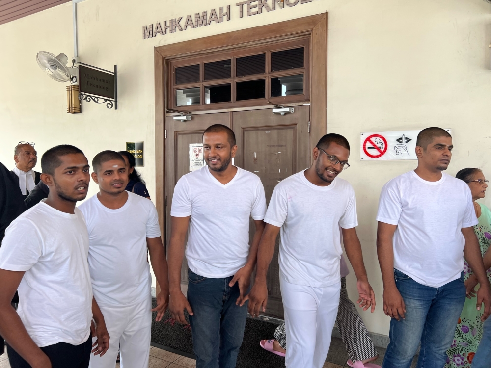 The five men (from left) K. Tatisan, V. Sharmah, S. Gopinaath, S. Gokulan and J. Ragesuthan after they were acquitted and released in 2022 — Picture by Opalyn Mok