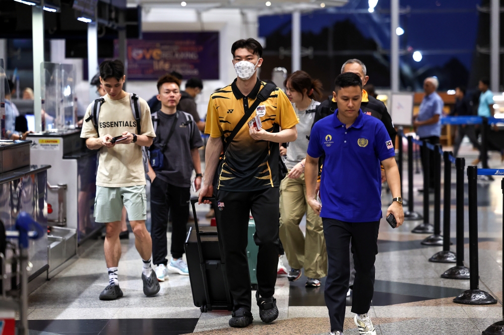 National men's singles badminton champion Lee Zii Jia departing for the Paris 2024 Olympic Games at KLIA on July 21. — Bernama pic