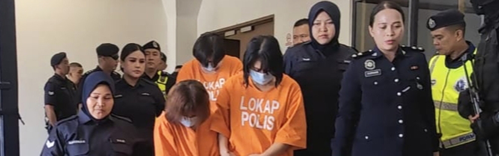 Police personnel escort the three female accused at the Kota Kinabalu Court Complex following proceedings on July 25, 2024. — The Borneo Post pic 