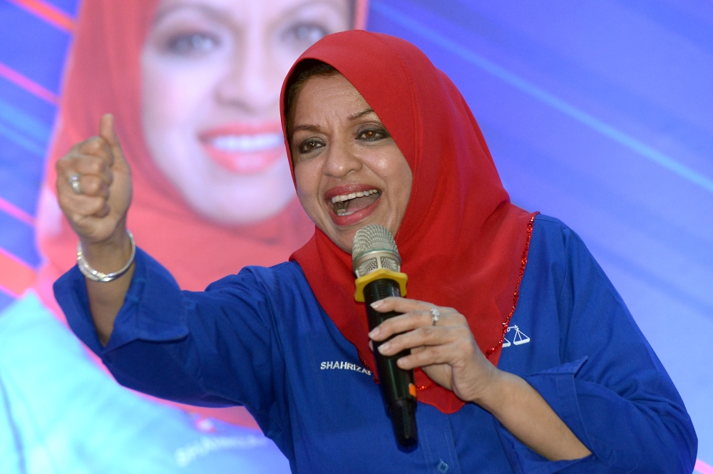 This 2018 file photograph shows Tan Sri Shahrizat Abdul Jalil launching a Wanita Barisan Nasional event in Kepong. Today, as Women and Family Affairs Council (Hawa) chairman, Shahrizat has once again involved various stakeholders who can create an environment where robust women-led businesses can flourish unhindered, says the author. — Picture by Mukhriz Hazim