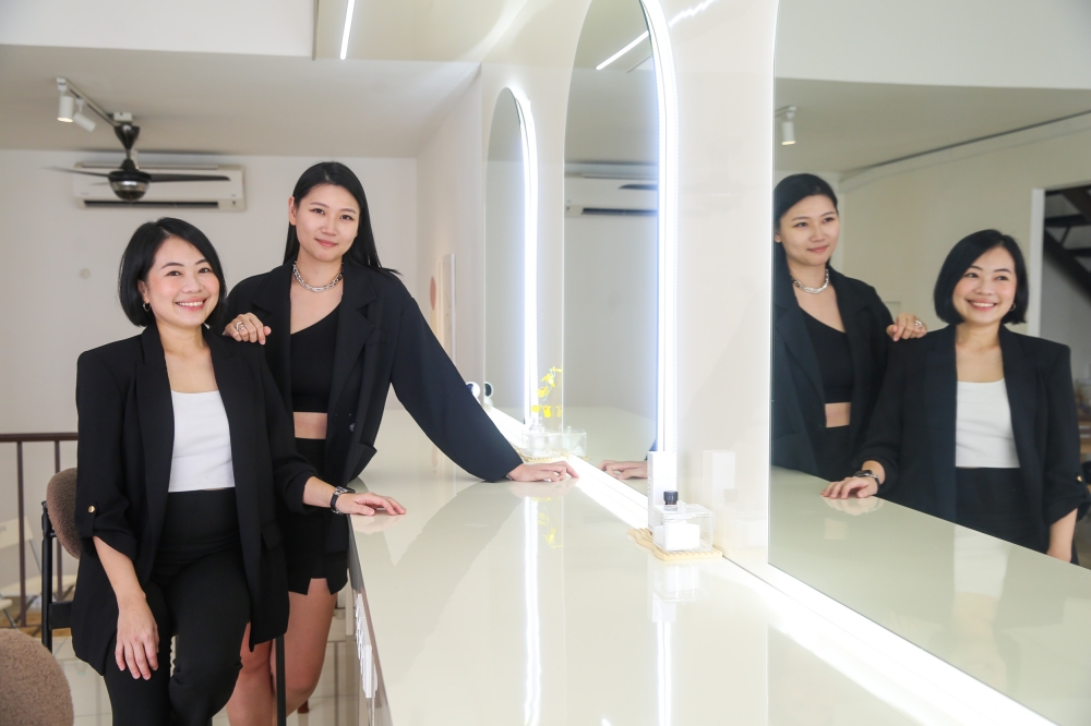 Founders of Fiu Studio Shallee Lee (left) and Asaki Yok speak to Malay Mail in Petaling Jaya July 19, 2024. — Picture by Choo Choy May