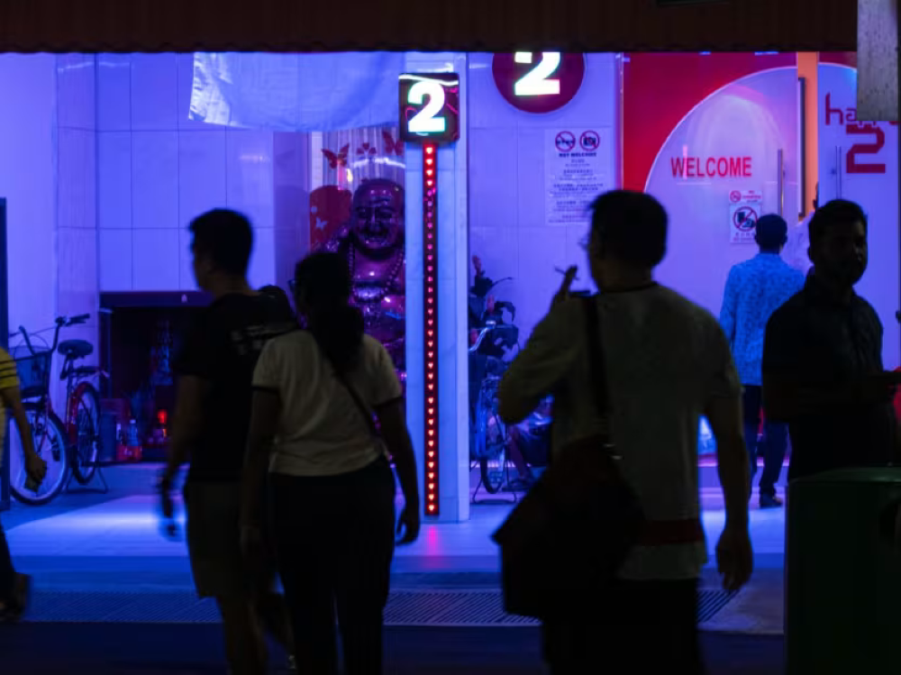 A brothel in Geylang. Prostitution is legal in Singapore, but these brothels have to obtain a licence from the Government in order to operate. — Nuria Ling/TODAY