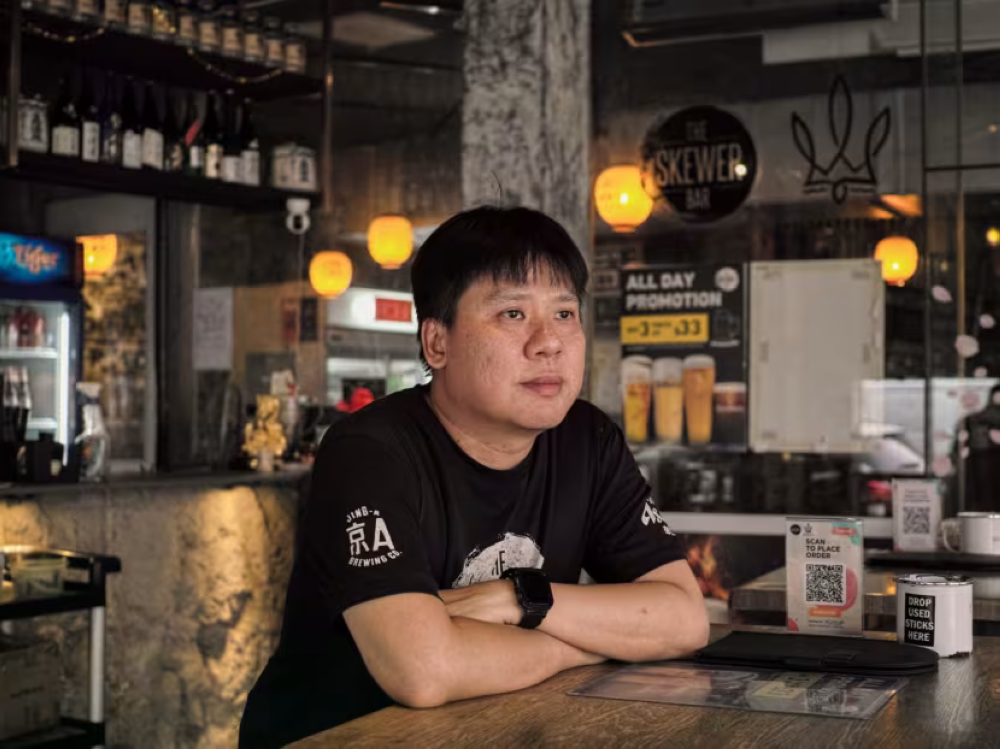 Mr Vincent Low, 40, co-founder of The Skewer Bar at Geylang, said he often has difficulties hiring young people to work for him. — Nuria Ling/TODAY