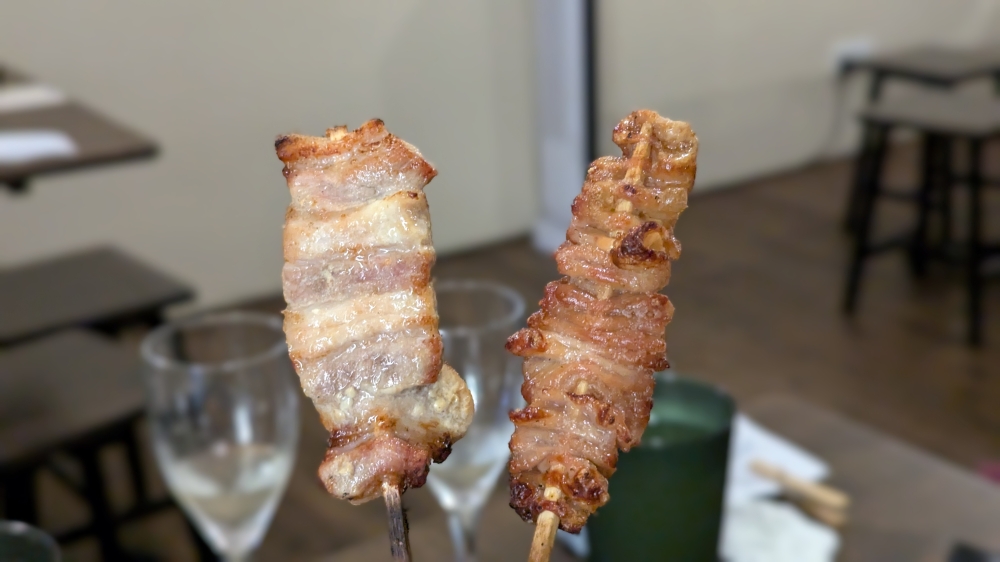 The pork belly and chicken wing skewers were some of the best on the menu. — Picture by Ethan Lau