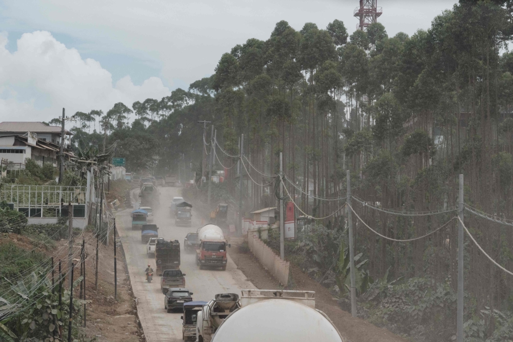 Construction vehicles driving along a road at the future Capital City of Nusantara in Penajam Paser Utara, East Kalimantan. — AFP pic