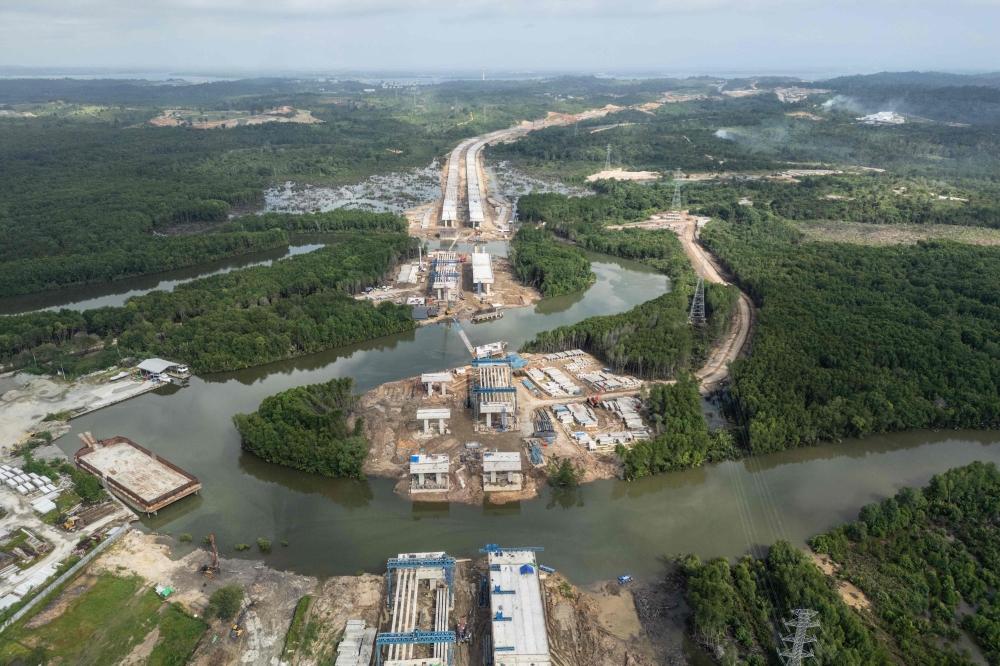 This picture taken on July 12, 2024 shows an aerial view of a new toll road, which connects the future capital city of Nusantara to Balikpapan. — AFP pic