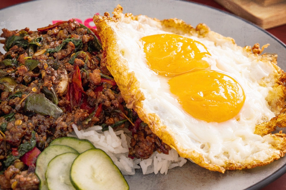 Pad Krapao Minced Pork with a double fried egg on rice. — Pictures courtesy of Pad Boy